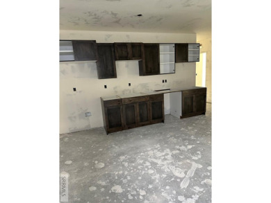 Prepare to be captivated! This brand-new 2025 twin home (2,824 on Sage Lakes Municipal Golf Course in Idaho - for sale on GolfHomes.com, golf home, golf lot