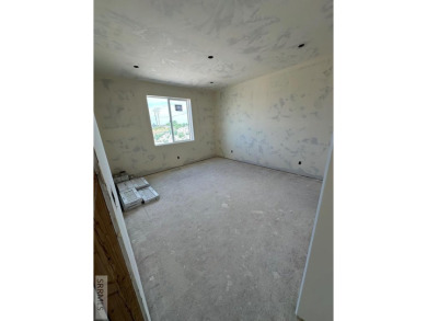 Prepare to be captivated! This brand-new 2025 twin home (2,824 on Sage Lakes Municipal Golf Course in Idaho - for sale on GolfHomes.com, golf home, golf lot