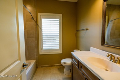 Welcome toyour beautifully maintained 4-bedroom, 3-bath home on Compass Pointe Golf Course in North Carolina - for sale on GolfHomes.com, golf home, golf lot