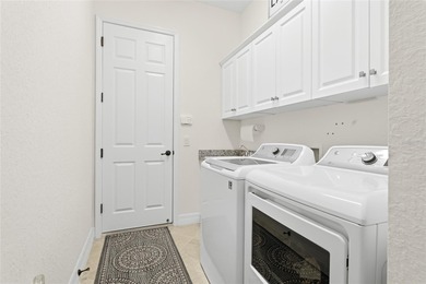 Experience tranquility in this beautiful estate home, nestled on on Plantation Golf and Country Club in Florida - for sale on GolfHomes.com, golf home, golf lot