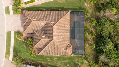 Experience tranquility in this beautiful estate home, nestled on on Plantation Golf and Country Club in Florida - for sale on GolfHomes.com, golf home, golf lot