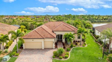 Experience tranquility in this beautiful estate home, nestled on on Plantation Golf and Country Club in Florida - for sale on GolfHomes.com, golf home, golf lot