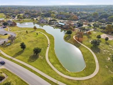 Dramatic entry welcomes you into elegant formal spaces accented on Timarron Country Club in Texas - for sale on GolfHomes.com, golf home, golf lot