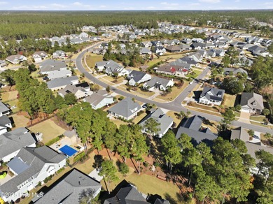 Welcome to this Trusst-built Chase II former model home on Compass Pointe Golf Course in North Carolina - for sale on GolfHomes.com, golf home, golf lot