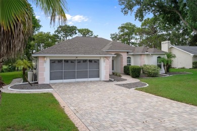 This meticulously maintained, gorgeous Alexander Custom-Built on Oak Hills Country Club in Florida - for sale on GolfHomes.com, golf home, golf lot