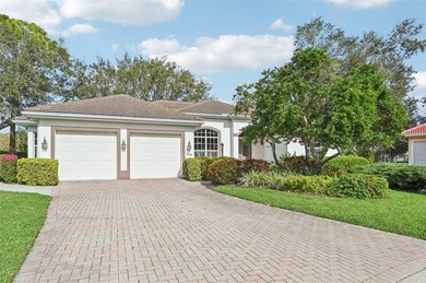 Beautiful, well-maintained three-bedroom, two-bath pool home is on The Venice Golf and Country Club in Florida - for sale on GolfHomes.com, golf home, golf lot