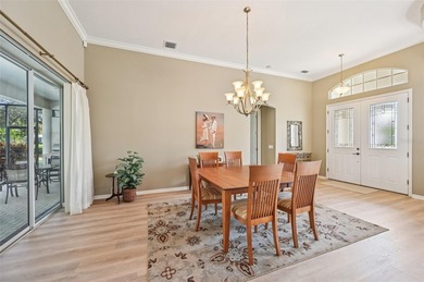 Beautiful, well-maintained three-bedroom, two-bath pool home is on The Venice Golf and Country Club in Florida - for sale on GolfHomes.com, golf home, golf lot