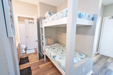 This spacious one bedroom unit, equipped with hall bunk beds, is on Sandpiper Cove Golf Course in Florida - for sale on GolfHomes.com, golf home, golf lot