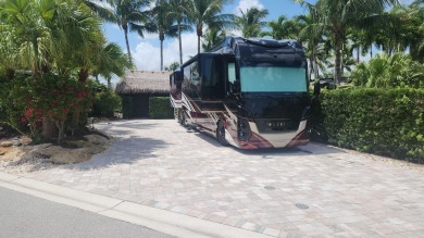 Beautiful corner pavered lot at the Motorcoach Resort of St on St. Lucie Trail Golf Club in Florida - for sale on GolfHomes.com, golf home, golf lot