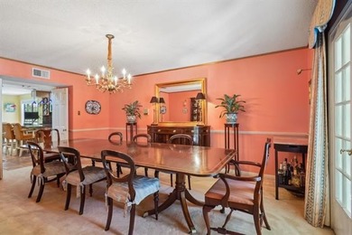 Lovely raised Acadian cottage on an oversized lot fronting the on Covington Country Club in Louisiana - for sale on GolfHomes.com, golf home, golf lot