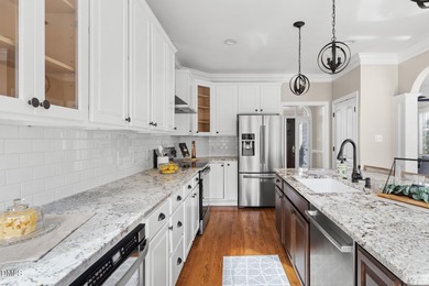 Set within the Stone Brook neighborhood of Governors Club, home on Governors Club in North Carolina - for sale on GolfHomes.com, golf home, golf lot