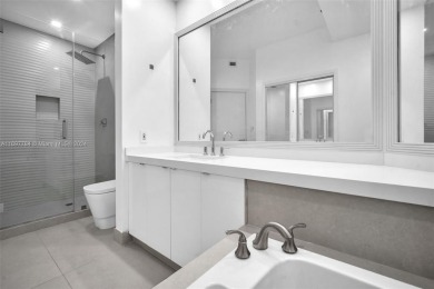 Stunning remodeled unit with golf views! Experience modern on Turnberry Isle Resort and Club in Florida - for sale on GolfHomes.com, golf home, golf lot
