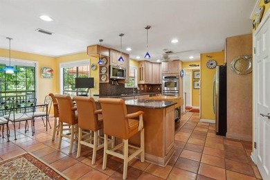 Lovely raised Acadian cottage on an oversized lot fronting the on Covington Country Club in Louisiana - for sale on GolfHomes.com, golf home, golf lot