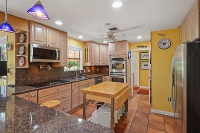 Lovely raised Acadian cottage on an oversized lot fronting the on Covington Country Club in Louisiana - for sale on GolfHomes.com, golf home, golf lot