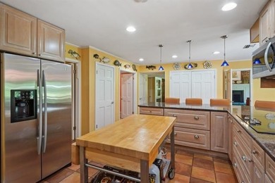 Lovely raised Acadian cottage on an oversized lot fronting the on Covington Country Club in Louisiana - for sale on GolfHomes.com, golf home, golf lot