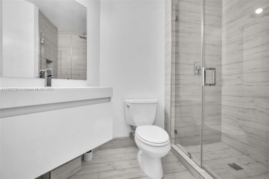 Stunning remodeled unit with golf views! Experience modern on Turnberry Isle Resort and Club in Florida - for sale on GolfHomes.com, golf home, golf lot