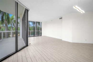 Stunning remodeled unit with golf views! Experience modern on Turnberry Isle Resort and Club in Florida - for sale on GolfHomes.com, golf home, golf lot