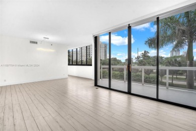 Stunning remodeled unit with golf views! Experience modern on Turnberry Isle Resort and Club in Florida - for sale on GolfHomes.com, golf home, golf lot