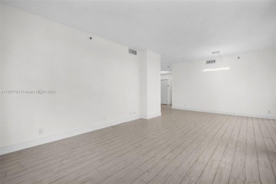 Stunning remodeled unit with golf views! Experience modern on Turnberry Isle Resort and Club in Florida - for sale on GolfHomes.com, golf home, golf lot