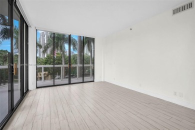 Stunning remodeled unit with golf views! Experience modern on Turnberry Isle Resort and Club in Florida - for sale on GolfHomes.com, golf home, golf lot