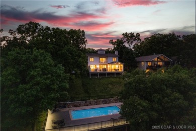 Nestled in the coveted Black Hawk Estates on a scenic bluff with on Seasons Ridge At Four Seasons in Missouri - for sale on GolfHomes.com, golf home, golf lot