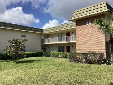 Furnished 1st floor popular *B* plan with private outdoor space on Vero Beach South Golf Course in Florida - for sale on GolfHomes.com, golf home, golf lot