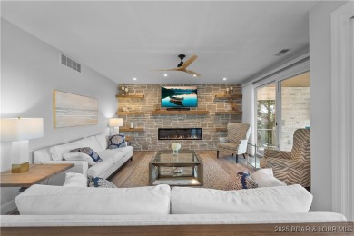 Nestled in the coveted Black Hawk Estates on a scenic bluff with on Seasons Ridge At Four Seasons in Missouri - for sale on GolfHomes.com, golf home, golf lot