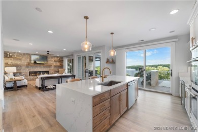 Nestled in the coveted Black Hawk Estates on a scenic bluff with on Seasons Ridge At Four Seasons in Missouri - for sale on GolfHomes.com, golf home, golf lot