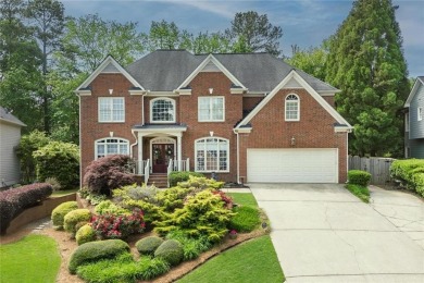 This beautiful 5-bedroom, 4-bathroom home in the highly on Brookstone Golf and Country Club in Georgia - for sale on GolfHomes.com, golf home, golf lot