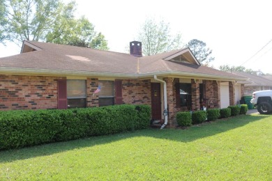 Older 4 bedroom home in a nice subdivision.  Close to town, golf on Millbrook Country Club in Mississippi - for sale on GolfHomes.com, golf home, golf lot
