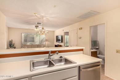 Experience delightful adult living in this 2-bedroom unit on Sun Village Golf Course in Arizona - for sale on GolfHomes.com, golf home, golf lot