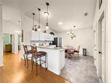 Welcome home! This cozy 2/2 Patio Villa in the Village of on Truman Executive Golf Course in Florida - for sale on GolfHomes.com, golf home, golf lot