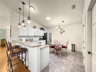 Welcome home! This cozy 2/2 Patio Villa in the Village of on Truman Executive Golf Course in Florida - for sale on GolfHomes.com, golf home, golf lot
