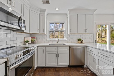 THIS IS THE ONE!! An exceptional opportunity to enjoy stunning on Raintree Country Club in North Carolina - for sale on GolfHomes.com, golf home, golf lot