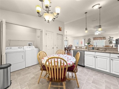 Welcome home! This cozy 2/2 Patio Villa in the Village of on Truman Executive Golf Course in Florida - for sale on GolfHomes.com, golf home, golf lot