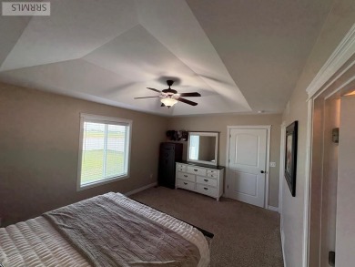 Charming duplex in a desirable neighborhood, on a quiet street on Blackfoot Municipal Golf Course in Idaho - for sale on GolfHomes.com, golf home, golf lot
