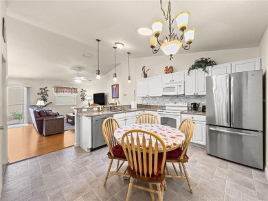 Welcome home! This cozy 2/2 Patio Villa in the Village of on Truman Executive Golf Course in Florida - for sale on GolfHomes.com, golf home, golf lot