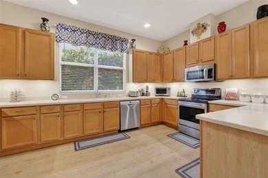 Discover the perfect blend of comfort and elegance in this on Plantation Golf Club in Florida - for sale on GolfHomes.com, golf home, golf lot