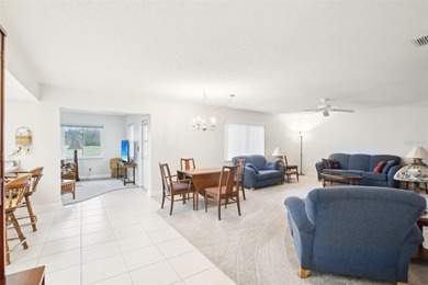 Nestled in the desirable Highgate F community in Kings Point on Falcon Watch Golf Club in Florida - for sale on GolfHomes.com, golf home, golf lot