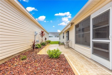 Welcome home! This cozy 2/2 Patio Villa in the Village of on Truman Executive Golf Course in Florida - for sale on GolfHomes.com, golf home, golf lot