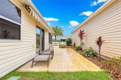 Welcome home! This cozy 2/2 Patio Villa in the Village of on Truman Executive Golf Course in Florida - for sale on GolfHomes.com, golf home, golf lot
