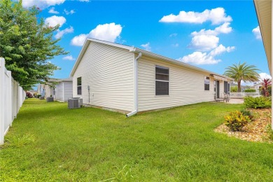 Welcome home! This cozy 2/2 Patio Villa in the Village of on Truman Executive Golf Course in Florida - for sale on GolfHomes.com, golf home, golf lot