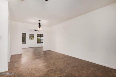 Lovely home located in popular phase 2 of Sun City. Home was on PalmBrook Country Club in Arizona - for sale on GolfHomes.com, golf home, golf lot