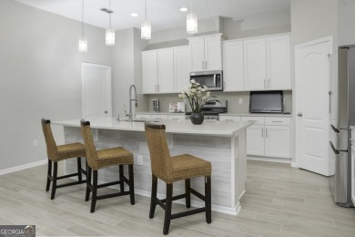 WELCOME TO THIS NEARLY NEW FOUR-BEDROOM, THREE-CAR GARAGE HOME on The Club At Osprey Cove in Georgia - for sale on GolfHomes.com, golf home, golf lot