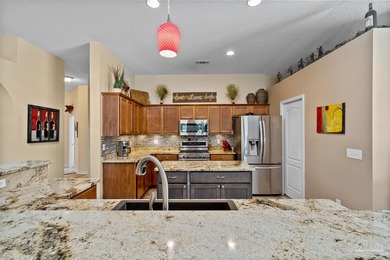 Welcome to this beautifully designed semi-custom built on Tanglewood Golf Club in Florida - for sale on GolfHomes.com, golf home, golf lot