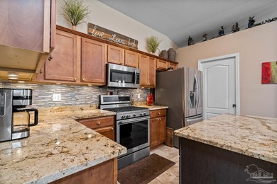 Welcome to this beautifully designed semi-custom built on Tanglewood Golf Club in Florida - for sale on GolfHomes.com, golf home, golf lot