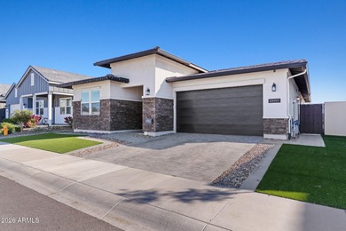 The Carlyle's inviting covered porch and entry flow into the on Sterling Grove Golf & Country Club in Arizona - for sale on GolfHomes.com, golf home, golf lot