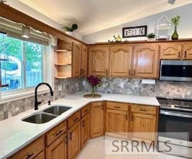 Exceptional Home with Custom Touches  Outdoor Perks in Fairway on Sage Lakes Municipal Golf Course in Idaho - for sale on GolfHomes.com, golf home, golf lot