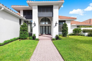 Discover a truly unique and inviting home, meticulously crafted on Bocaire Country Club in Florida - for sale on GolfHomes.com, golf home, golf lot