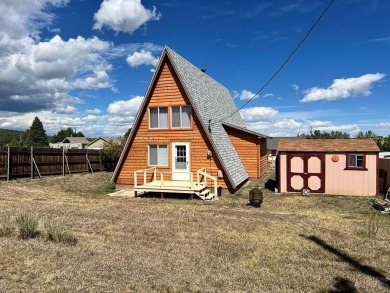 NEW ROOF! NEW CEDAR SIDING and a perfect location! Lake Beckwith on Hollydot Golf Course in Colorado - for sale on GolfHomes.com, golf home, golf lot